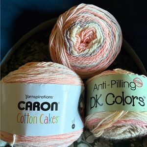 2 Caron Cotton Cakes Yarn and one DK sweet roll from Premier. All new.